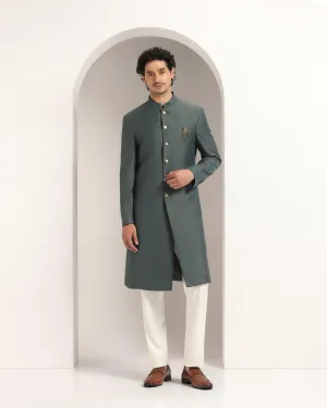 Swarn Two Piece Dark Green Textured Achkan Set - Dimitri